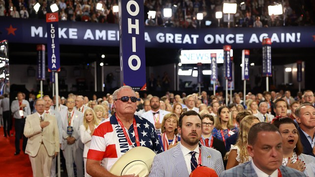 Delegates from Ohio stand for the Pledge of Allegiance at the opening of the Republican National Convention on July 15, 2024, in Milwaukee. (Joe Raedle/Getty Images)